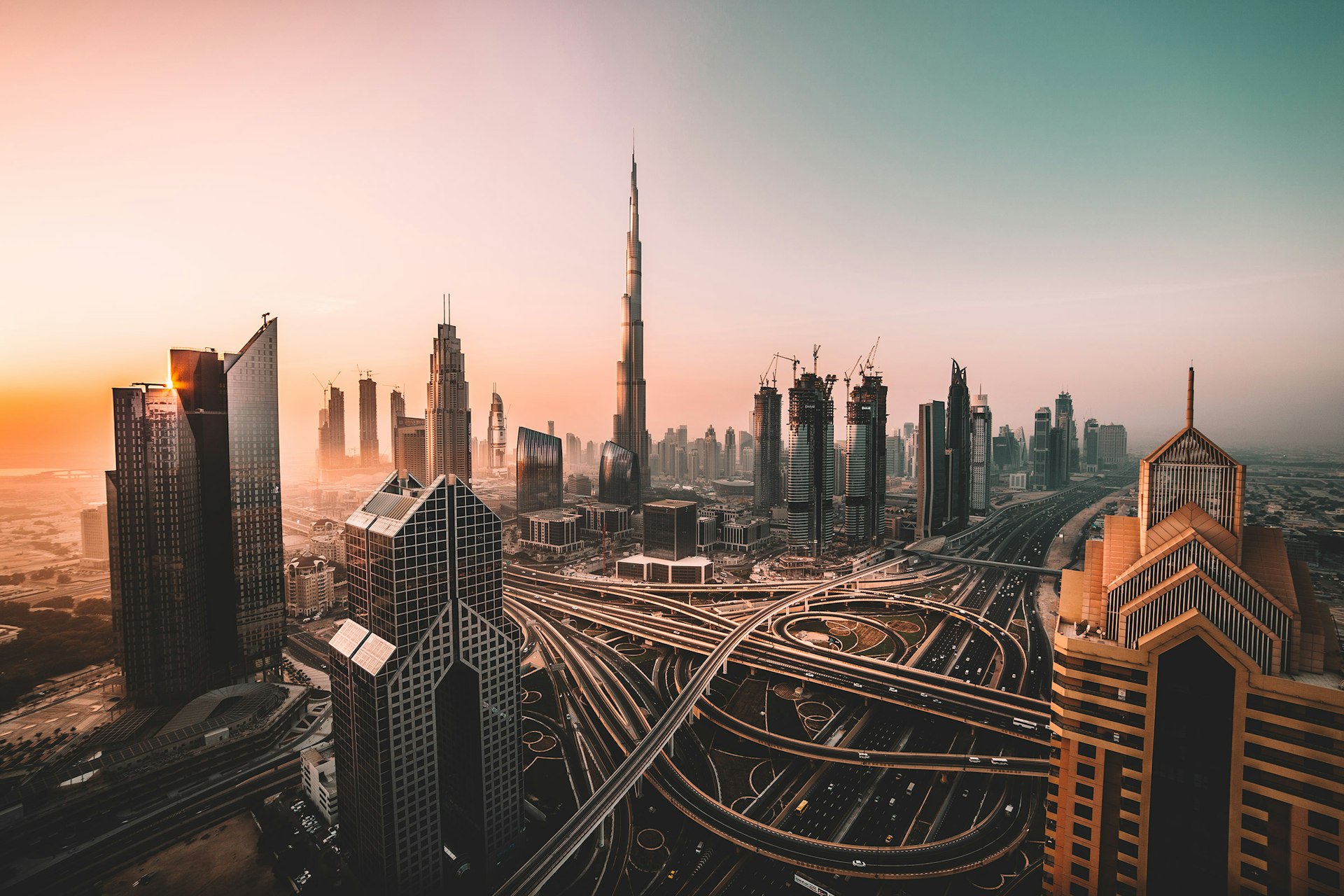 Dubai skyline with Burj Khalifa at sunset, Surat to Dubai holiday packages