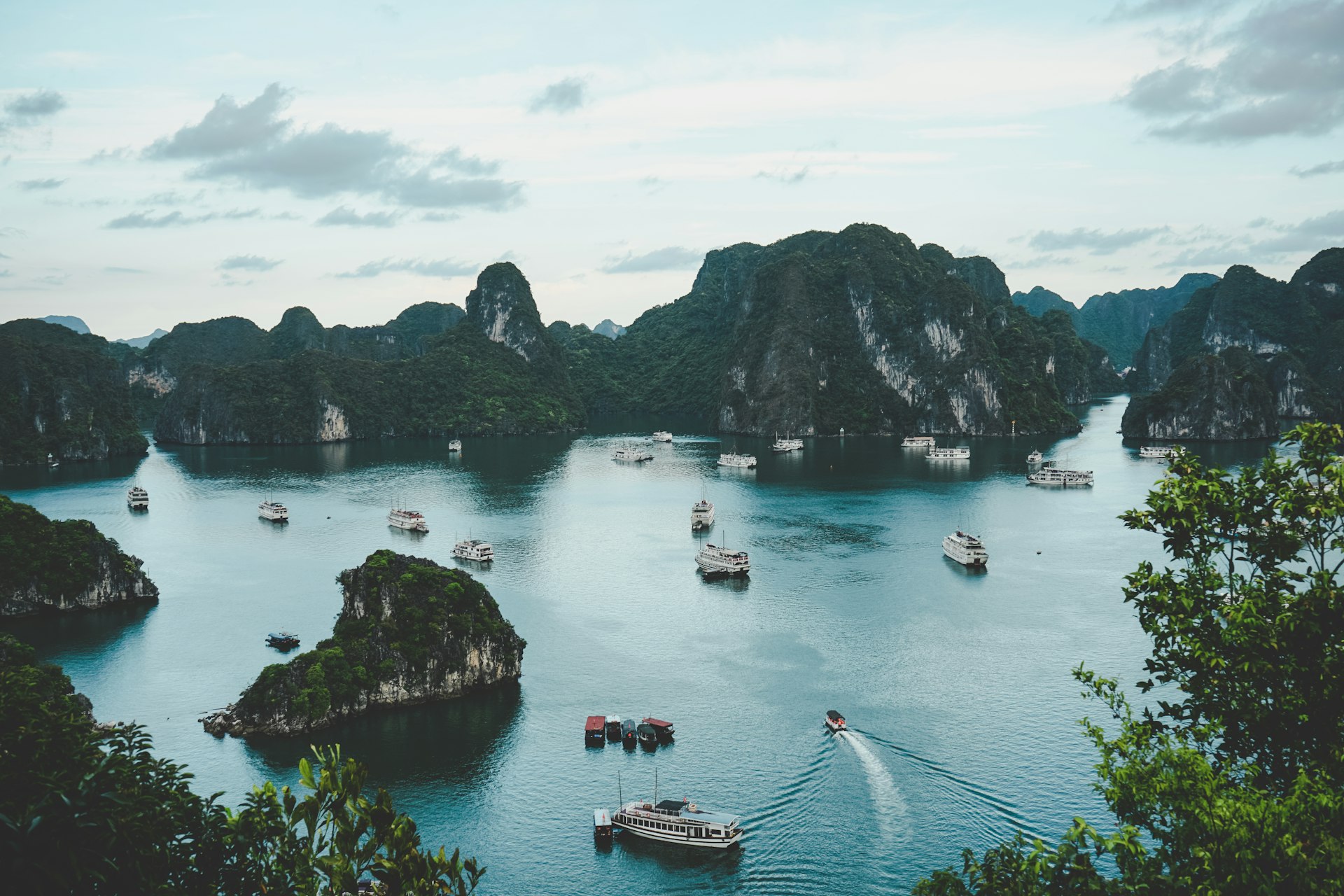 Cruise boats among the limestone karsts of Ha Long Bay, northern Vietnam