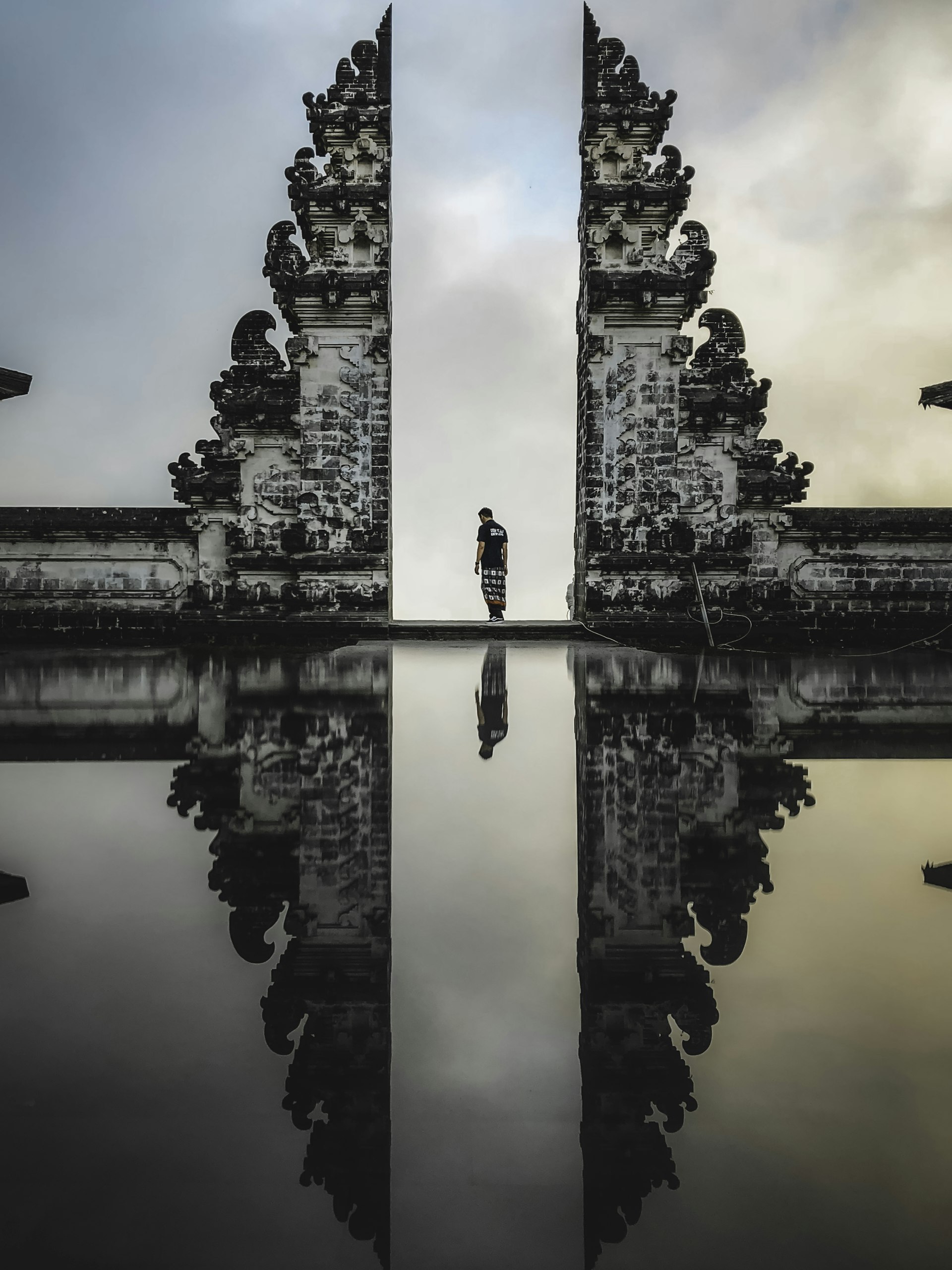 Bali temple and rice terraces in lush green landscape, Surat to Bali holiday packages