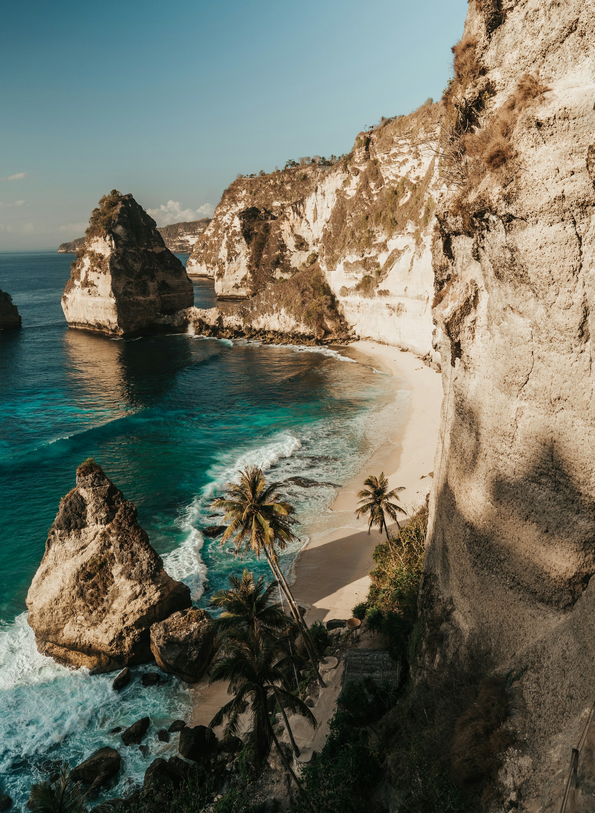 Romantic Bali beach and coastline at sunset