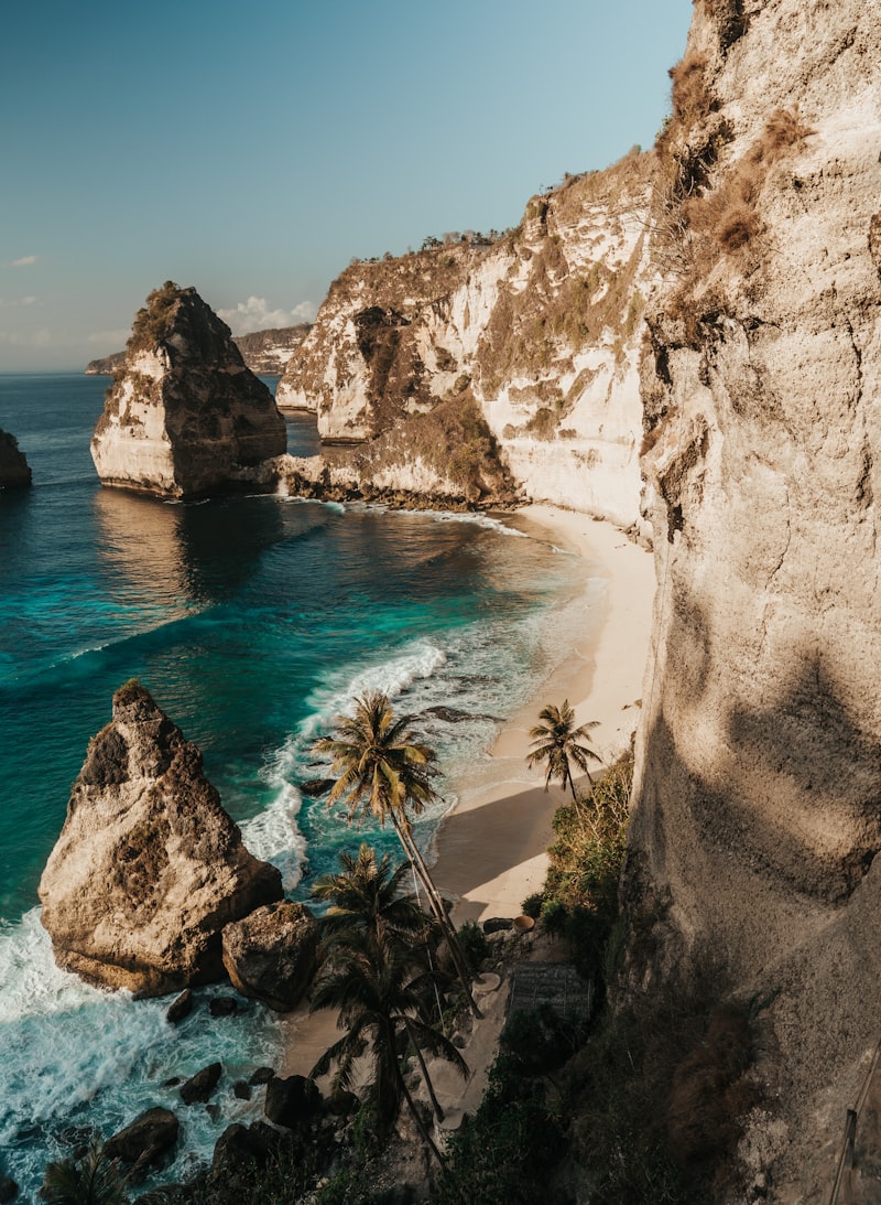 Romantic Bali beach and coastline at sunset